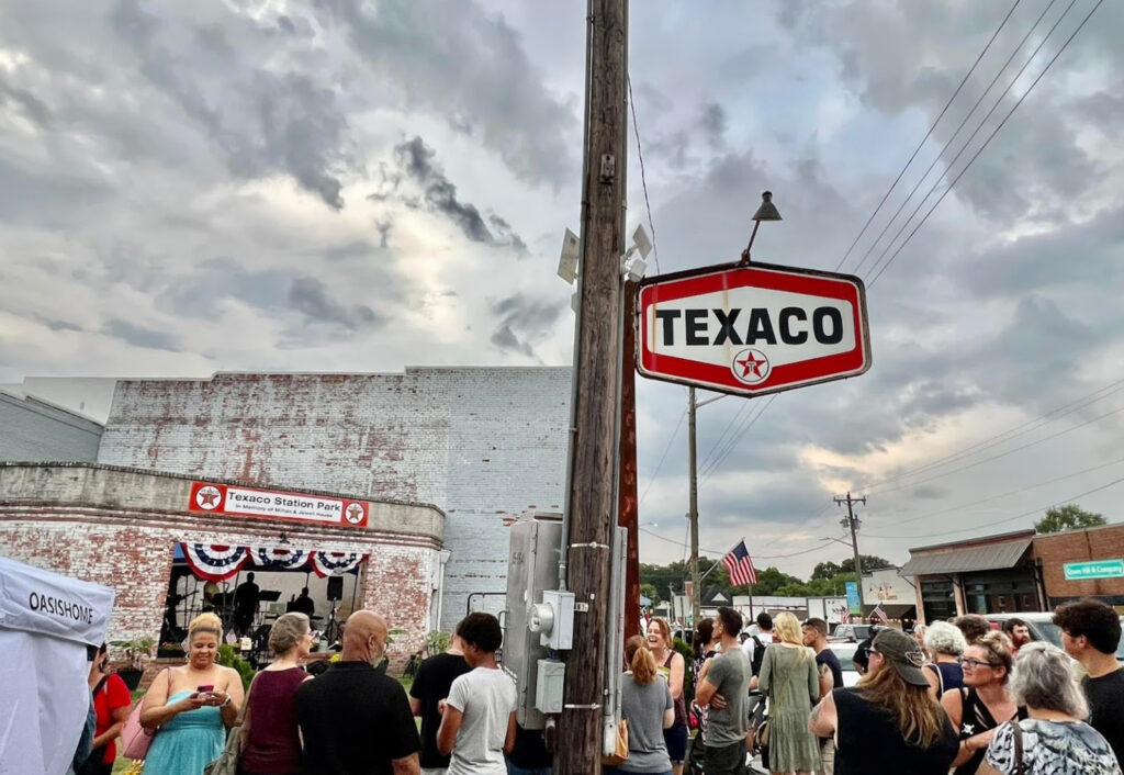 Local crowd gathers at Texaco Station Park in Franklinton, NC for a concert.
