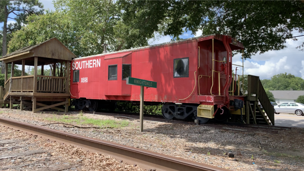 Red train caboose marks Knightdale Station