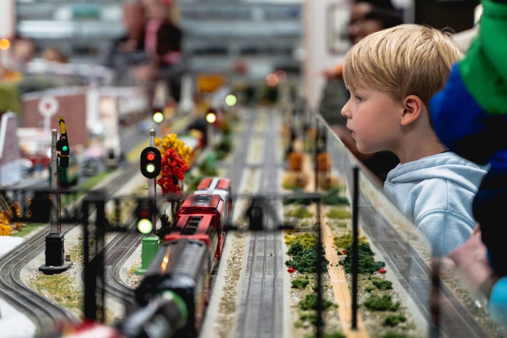 The Mebane Train Display is loved by people who live in Mebane. Image of a child overlooking the train display.