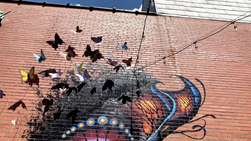 beautiful butterfly mural on brick building in Sanford NC