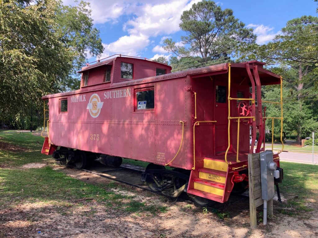 Ashworth Park in downtown Fuquay-Varina, NC has a red caboose.